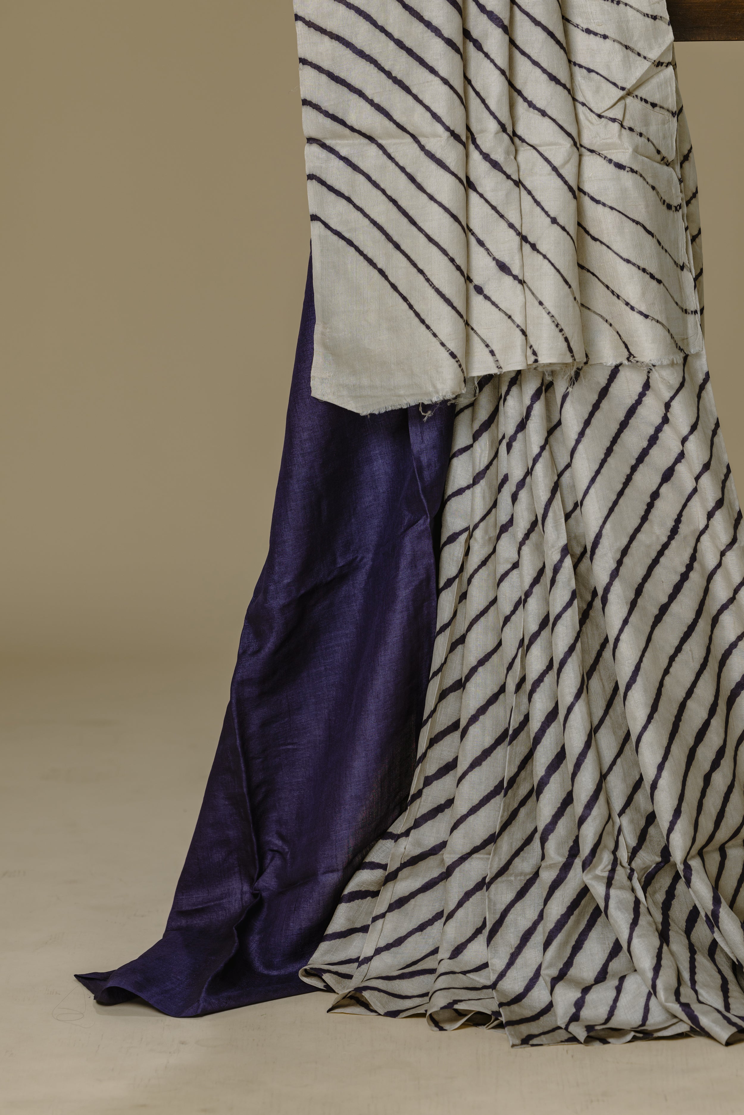 White Tusser Silk Leharia Saree with Grey Blouse